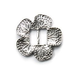 Dije para corbatin flor niq.